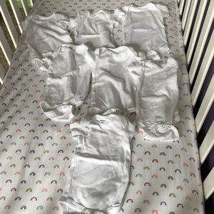 White onesies (set of 7)